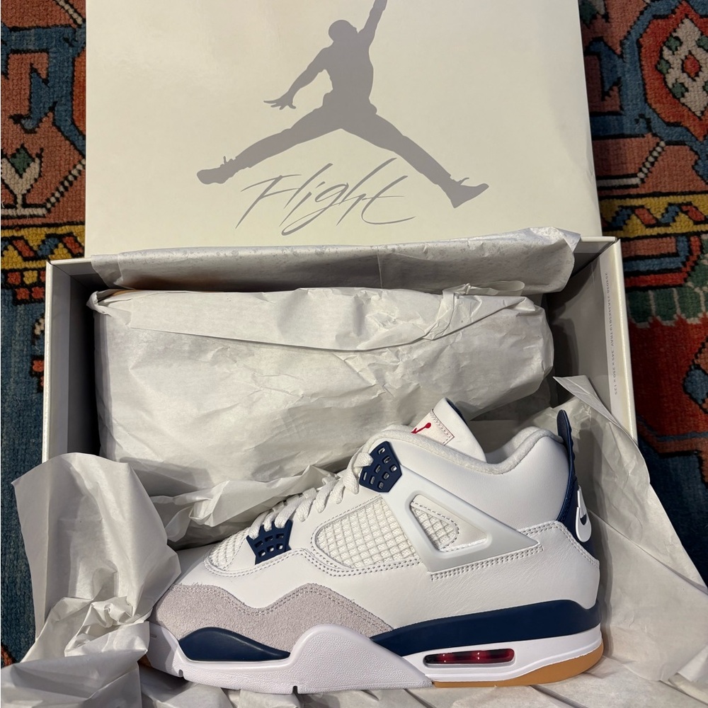 Air Jordan 4 Retro White and Navy Sneakers